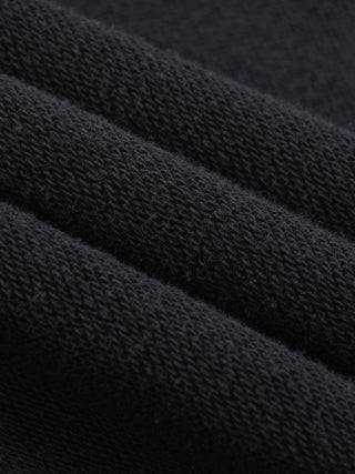 Paradigm Snow Wash Baggy Sweatpants macro detail of knit fabric weave texture in dark gray