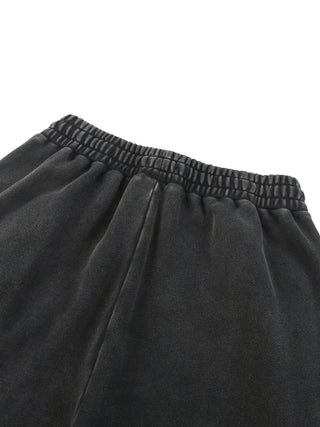 Paradigm Snow Wash Baggy Sweatpants close-up of rear elastic waistband detail in dark gray