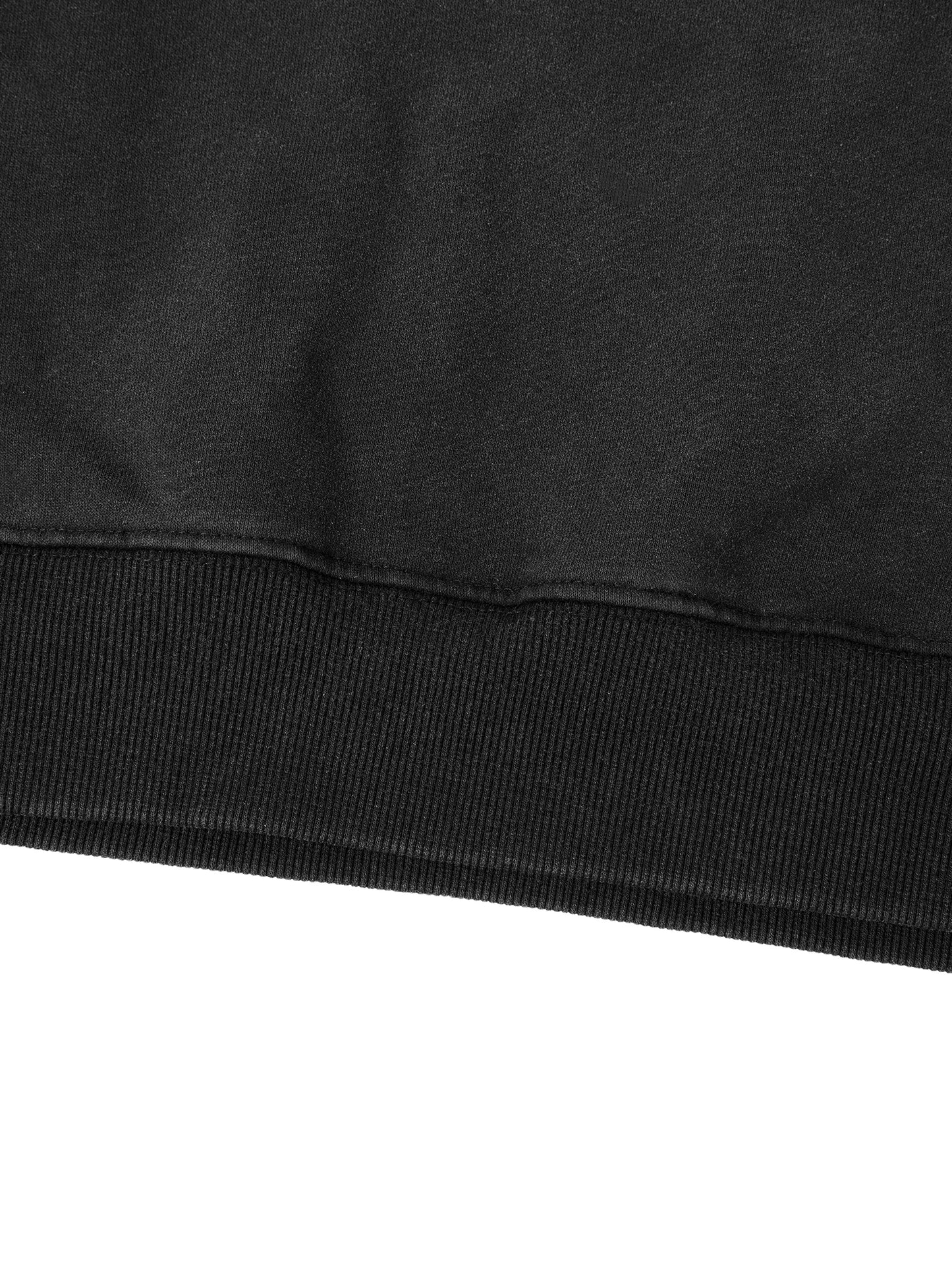 Close up of 400 GSM heavyweight cotton texture with vintage snow wash effect and distressed hem detailing.