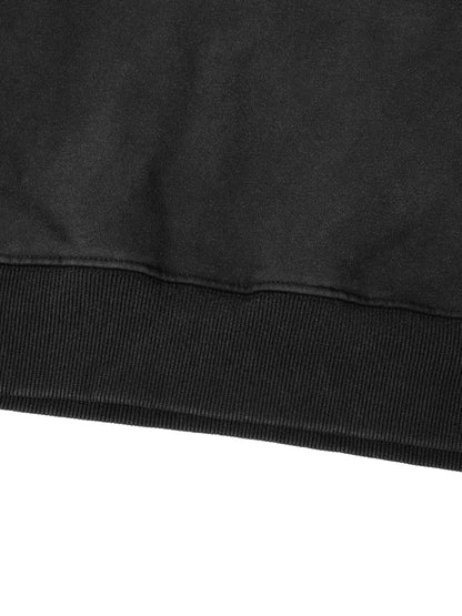 Close up of 400 GSM heavyweight cotton texture with vintage snow wash effect and distressed hem detailing.