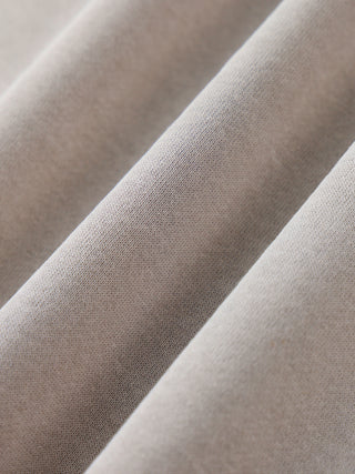 Close-up of Paradigm crewneck ribbed hem band detail