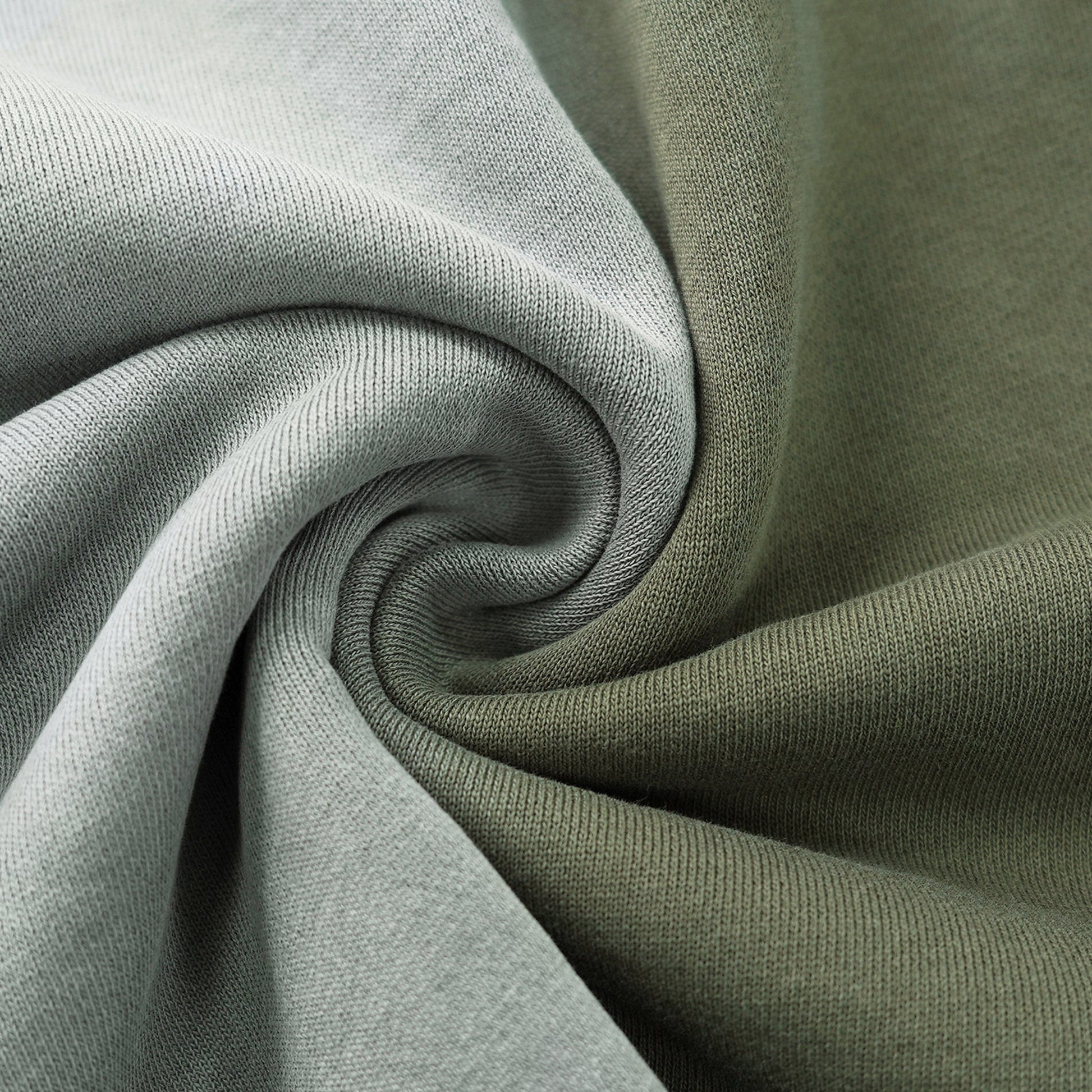 Close-up of green fabric with a swirl pattern