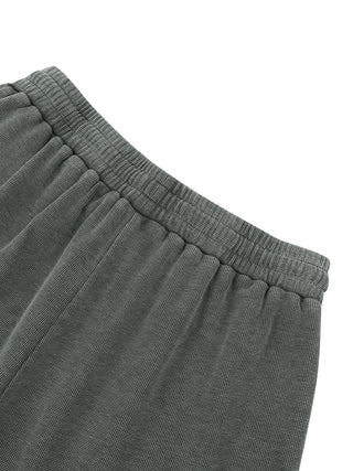 Back waistband detail of the gray Existential waffle knit sweatpants, showing the gathered elastic and clean seaming