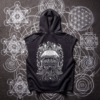 Back of the Mycelial Network snow washed boxy hooded tank top in black, styled on dark asphalt covered in white chalk sacred geometry, showing the white line-art all-seeing eye in a triangle above a large mushroom cap and a web of mycelium roots.