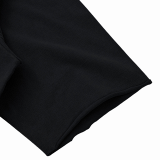 Cosmic Connection mineral wash raw-hem boxy tee in black on a concrete backdrop, 330 GSM heavyweight cotton