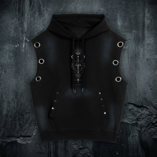 A black sleeveless hooded vest with silver-tone metal grommets on the sides, a front pouch pocket, and a decorative gothic mushroom-and-eye graphic down the center, displayed against a dark textured wall.