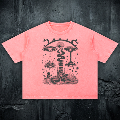 Front flat lay view of the Paradoxical Perspective 275 GSM heavyweight boxy t-shirt in a vibrant coral mineral wash, featuring intricate black surrealist visionary art of eyes and esoteric geometry.