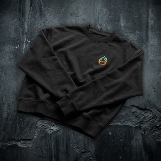 Front of the Life's a Beach crewneck sweatshirt in black, folded to show the Phantasmagorical logo on the left chest