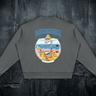 Back of the Life's a Beach crewneck sweatshirt in dark gray, printed with a beach scene inside a goldfish bowl under the arched Phantasmagorical wordmark