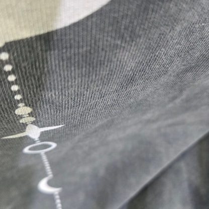 Existential snow wash tee hem stitching detail