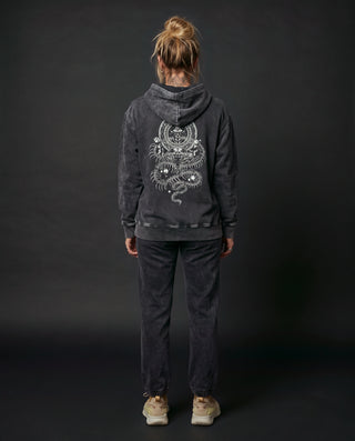 Model wearing the Spirit Molecule snow wash fleece relaxed fit hoodie in Black, back view, showing the full back artwork.
